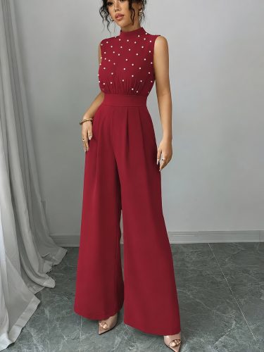 Kadın balıkçı yaka kolsuz incili beli kuşaklı uzun janjan tulum