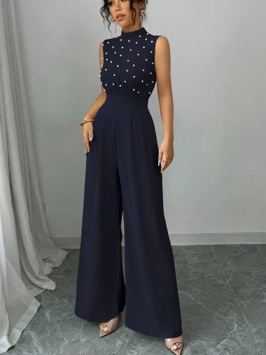 Kadın balıkçı yaka kolsuz incili beli kuşaklı uzun janjan tulum