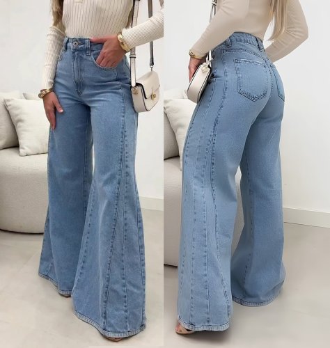 Kadın yüksek bel paçaya doğru geniş kesimli kot pantolon