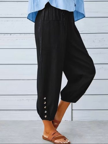 Kadın beli lastikli bağcıklı düğme detaylı pantolon